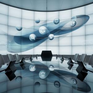 Modern office with digital wall, smart devices, and holographic analytics.